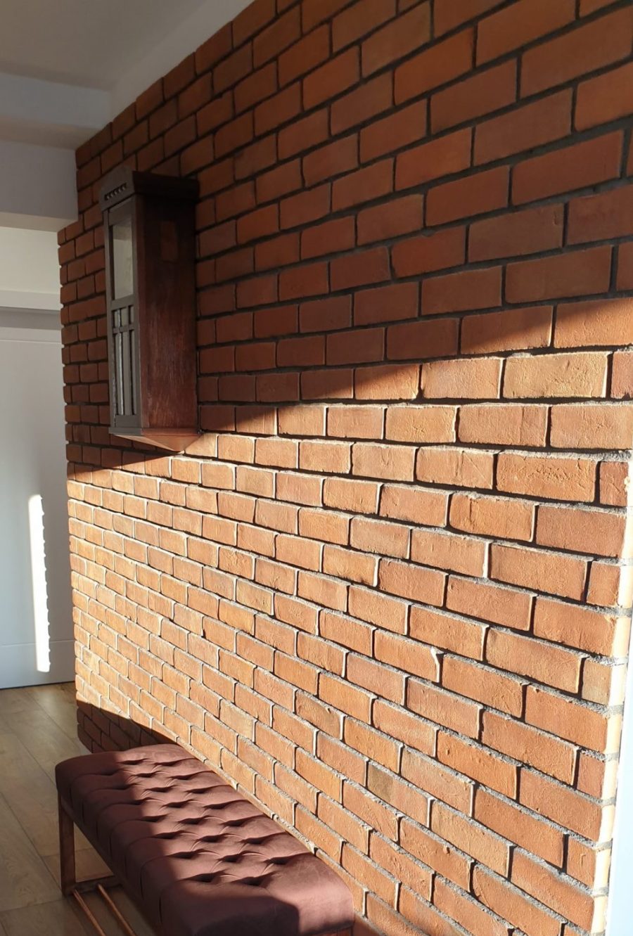 brick wall red hand produced